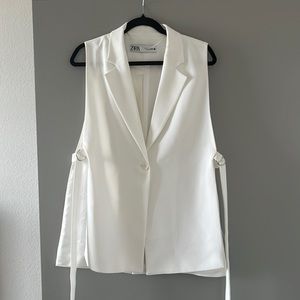 Zara white sleeveless blazer with open sides. Size small. Only worn once.